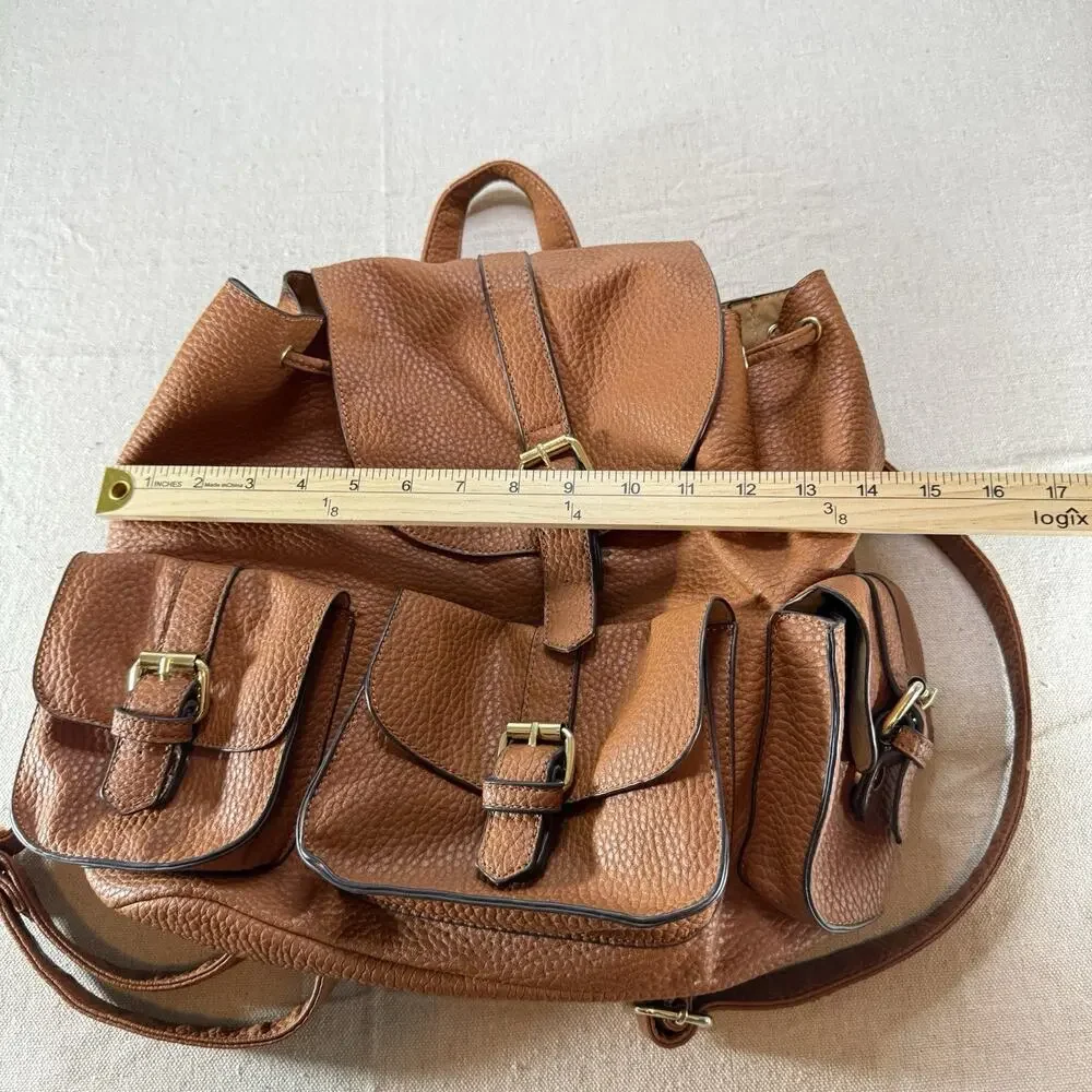 JustFab Brown Faux Leather Mini Backpack Purse Drawstring Flap Buckle Pockets